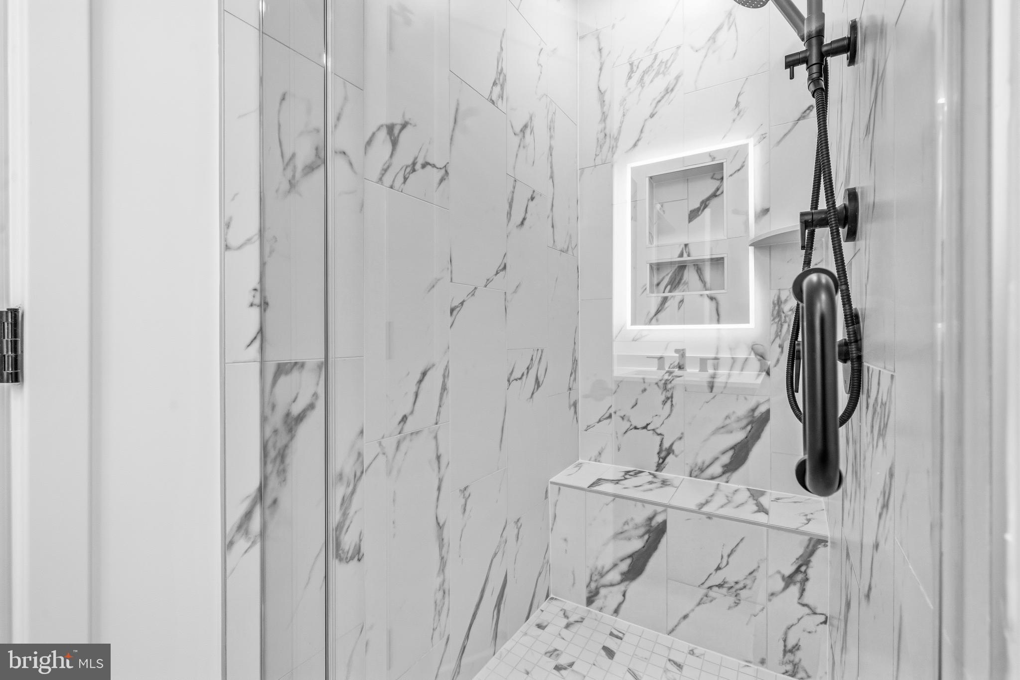 2040 Tysons Ridgeline Road Falls Church, VA 22043 - Photo 26 of 56 a bathroom with a shower