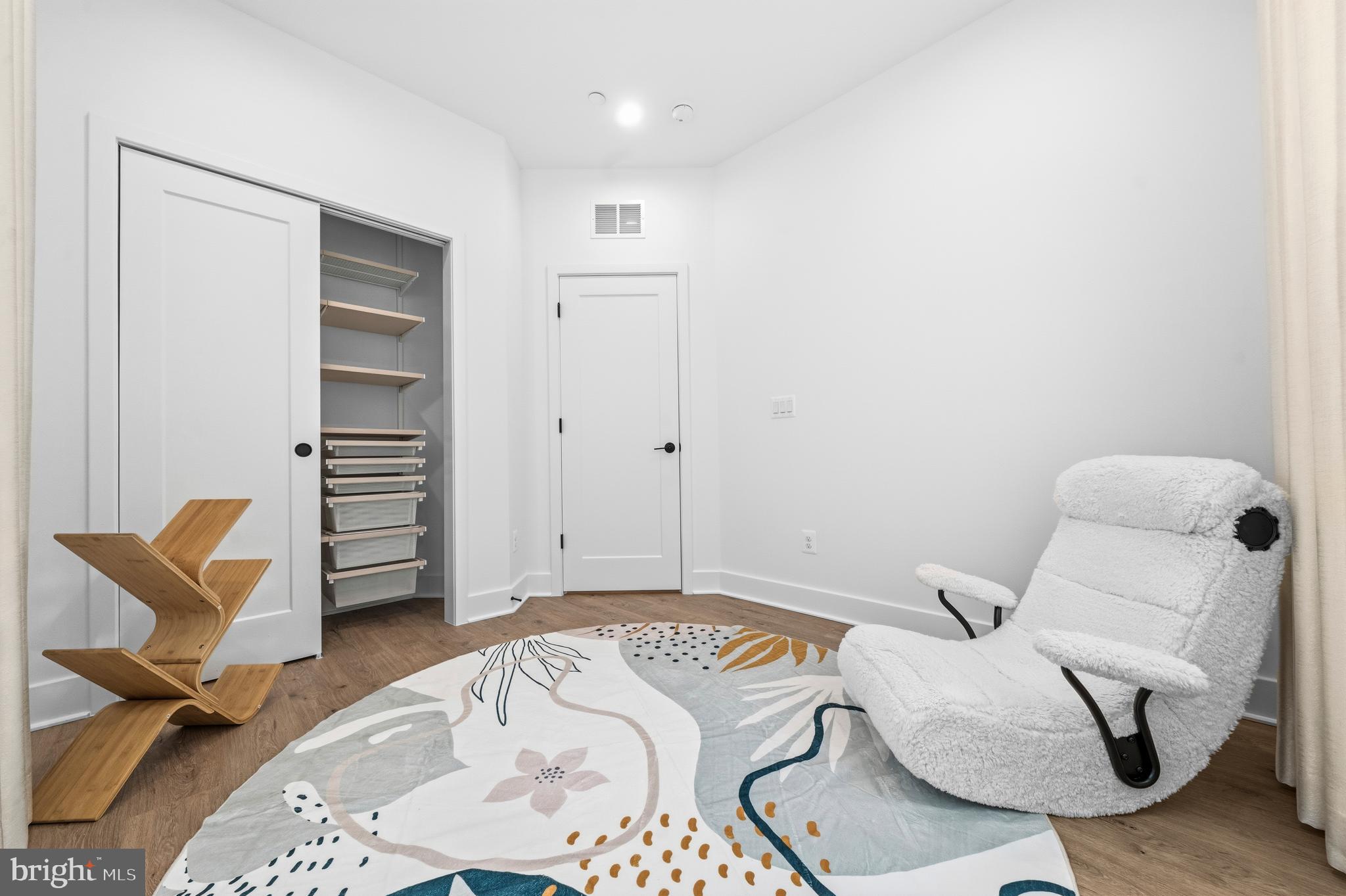 2040 Tysons Ridgeline Road Falls Church, VA 22043 - Photo 28 of 56 a bedroom with a bed and furniture