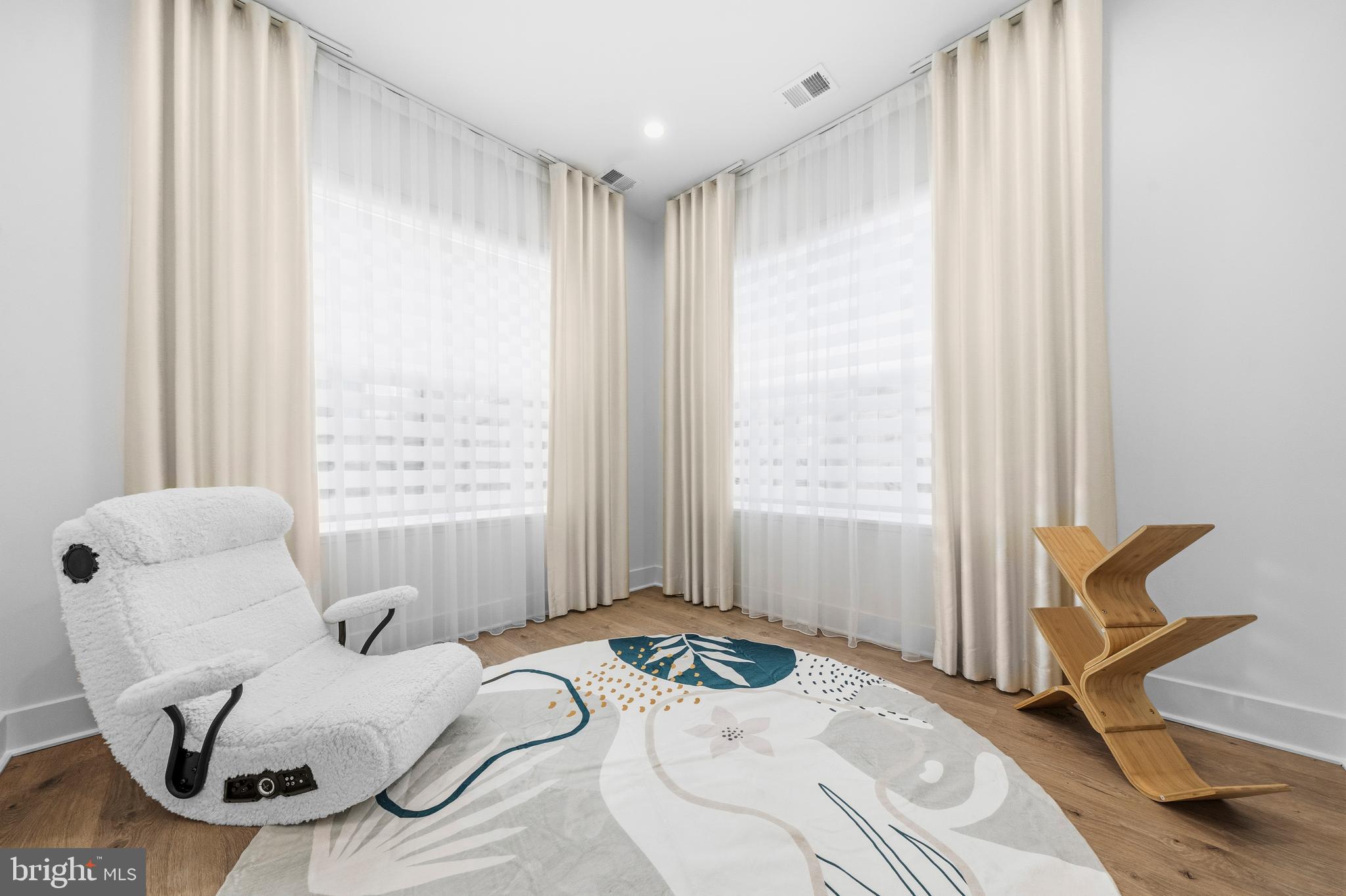 2040 Tysons Ridgeline Road Falls Church, VA 22043 - Photo 29 of 56 a bedroom with a bed and a large window