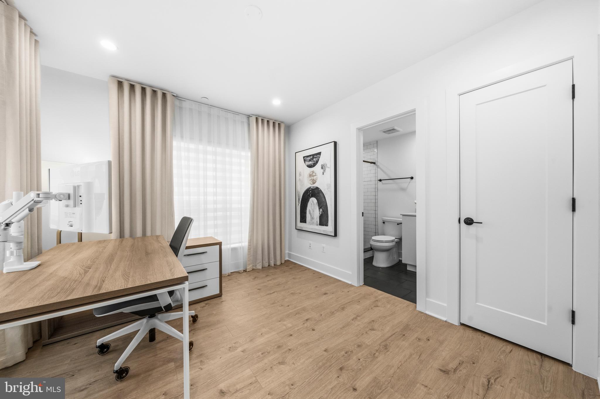 2040 Tysons Ridgeline Road Falls Church, VA 22043 - Photo 44 of 56 a view of a livingroom with furniture and a window