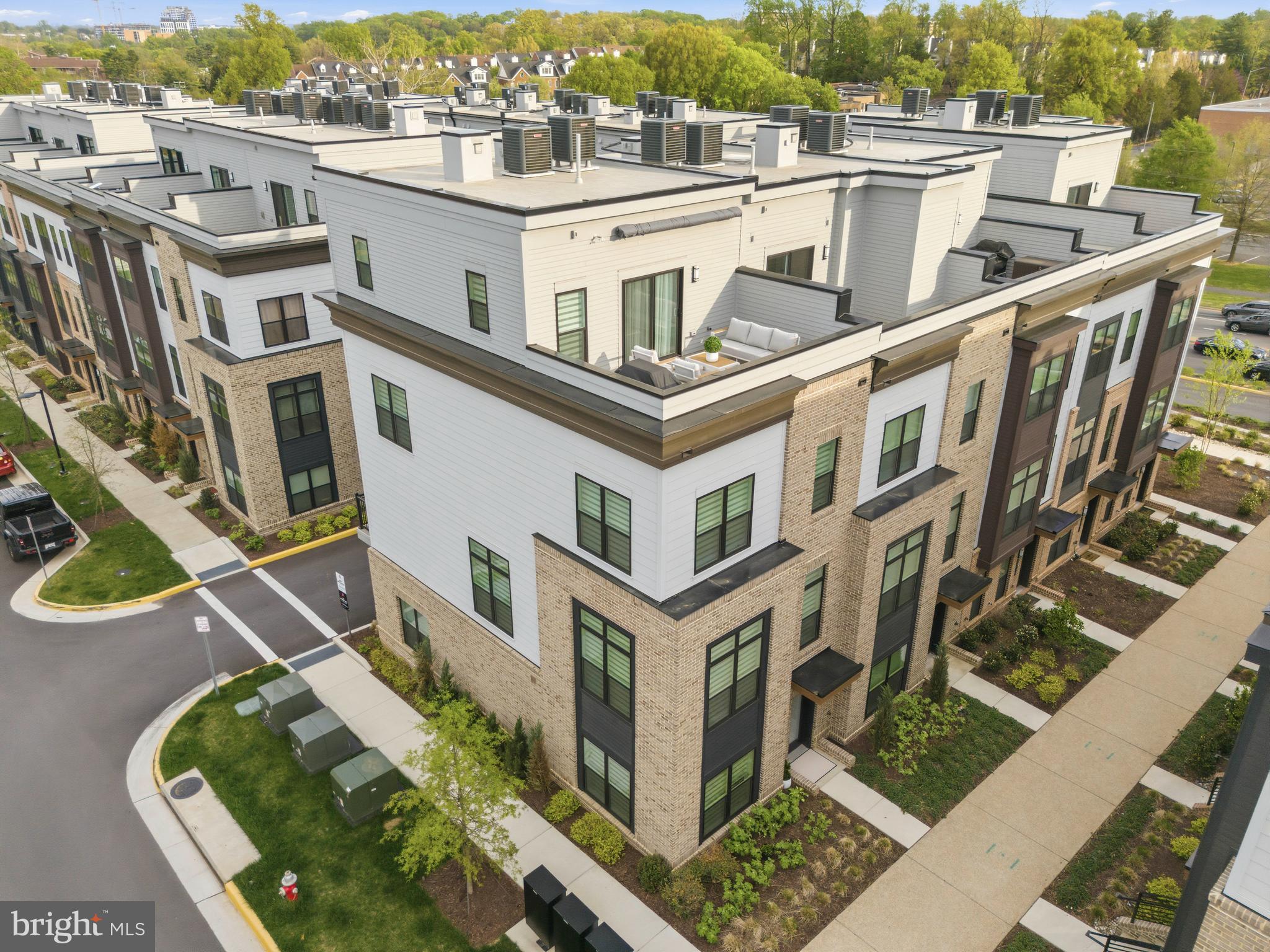 2040 Tysons Ridgeline Road Falls Church, VA 22043 - Photo 52 of 56 an aerial view of a house with a swimming pool