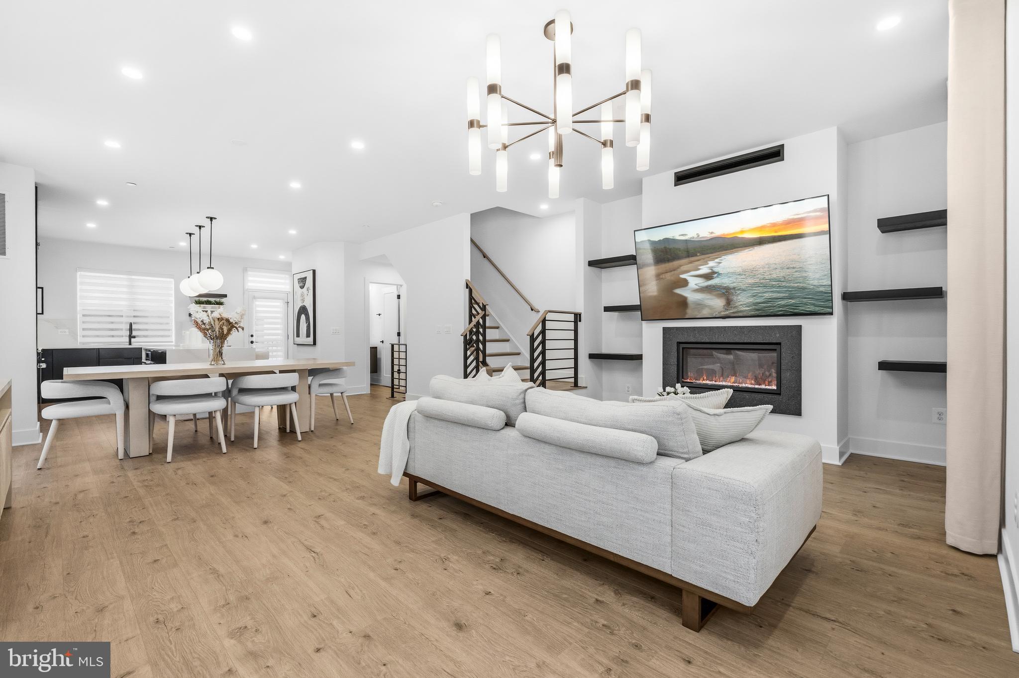 2040 Tysons Ridgeline Road Falls Church, VA 22043 - Photo 7 of 56 a living room with furniture and a large window