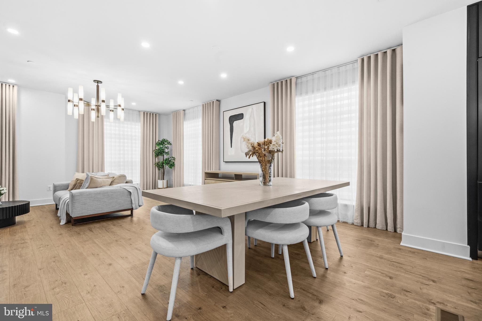 2040 Tysons Ridgeline Road Falls Church, VA 22043 - Photo 9 of 56 a view of a dining room with furniture and wooden floor