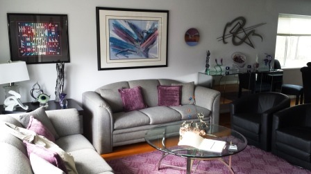 1150 Lee Road Northbrook, IL 60062 - Photo 9 of 11 a living room with furniture a rug and wall paintings