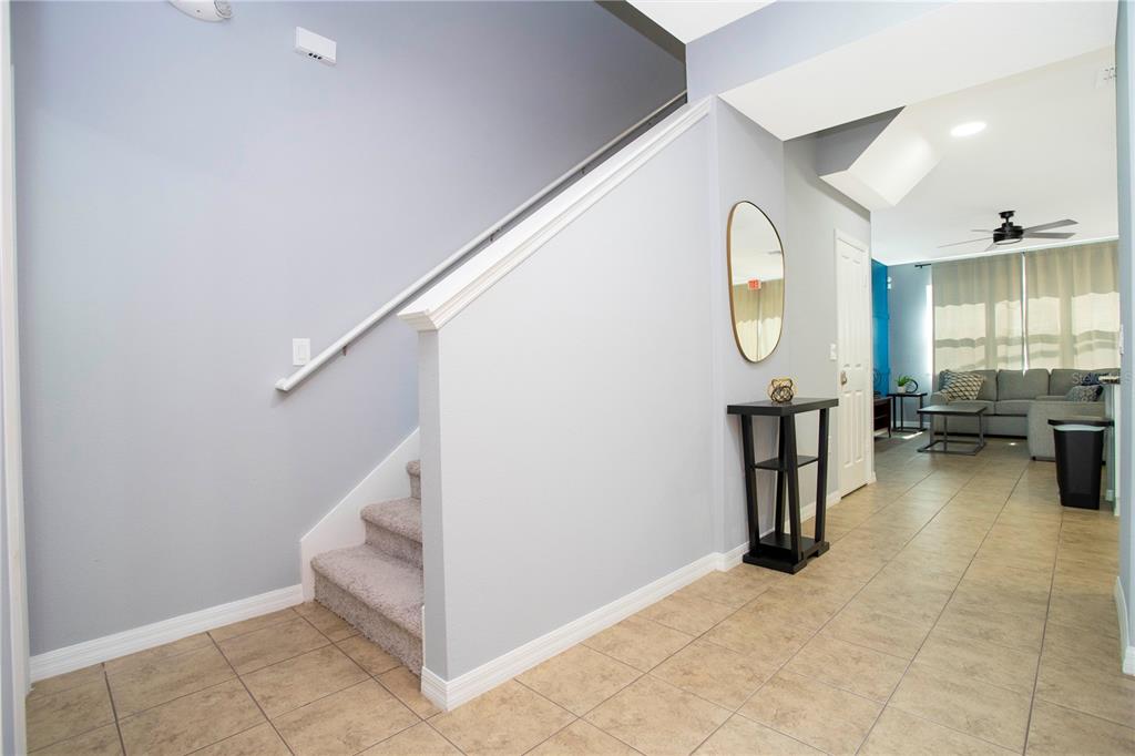 3181 Tocoa Circle Kissimmee, FL 34746 - Photo 14 of 87 a view of a livingroom with wooden floor and furniture