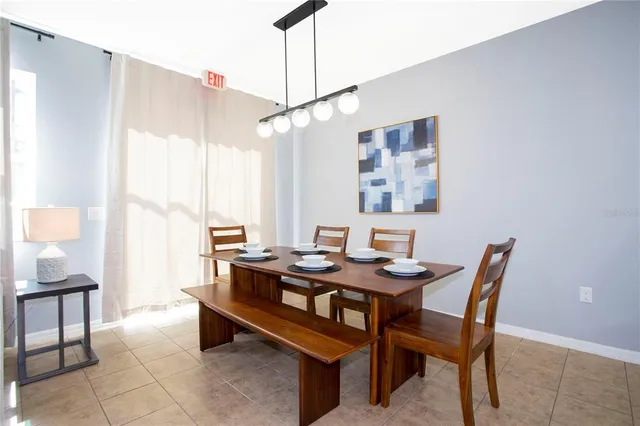 a bedroom with furniture and a chandelier