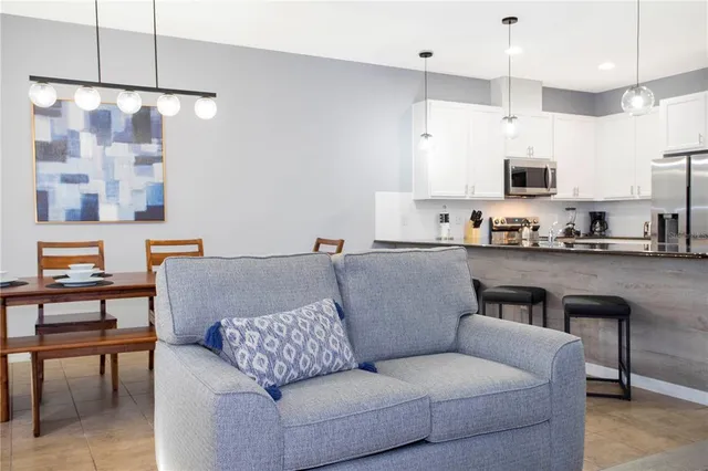 a view of a chairs and table in the patio
