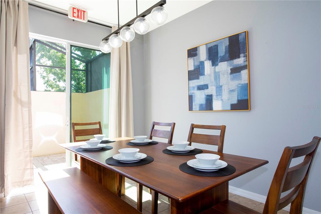 3181 Tocoa Circle Kissimmee, FL 34746 - Photo 37 of 87 a dining room with furniture and window