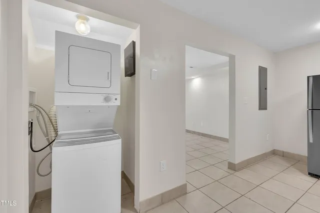 a view of a room with white walls