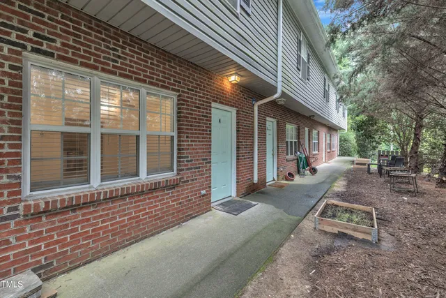 a front view of a house with a garage