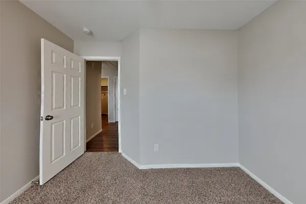 a view of hallway with closet