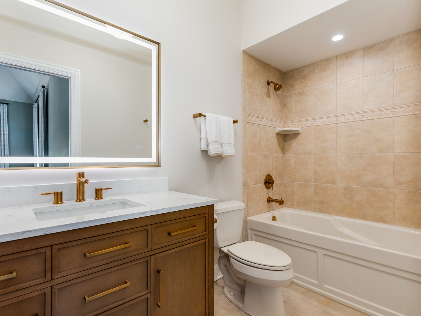 4N881 Old Farm Road St. Charles, IL 60175 - Photo 37 of 66 a bathroom with a sink a toilet and a mirror