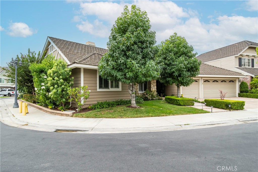 6250 Majorca Circle Long Beach, CA 90803 - Photo 1 of 35 a front view of house with yard and green space