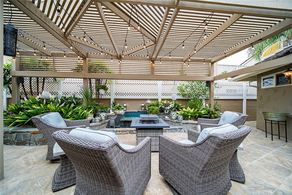 6250 Majorca Circle Long Beach, CA 90803 - Photo 11 of 35 a view of a patio with couches table and chairs and potted plants