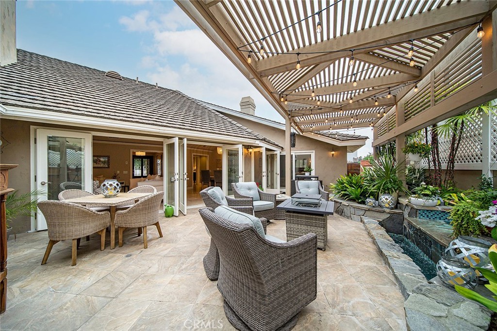 6250 Majorca Circle Long Beach, CA 90803 - Photo 12 of 35 a view of a house with backyard and sitting area