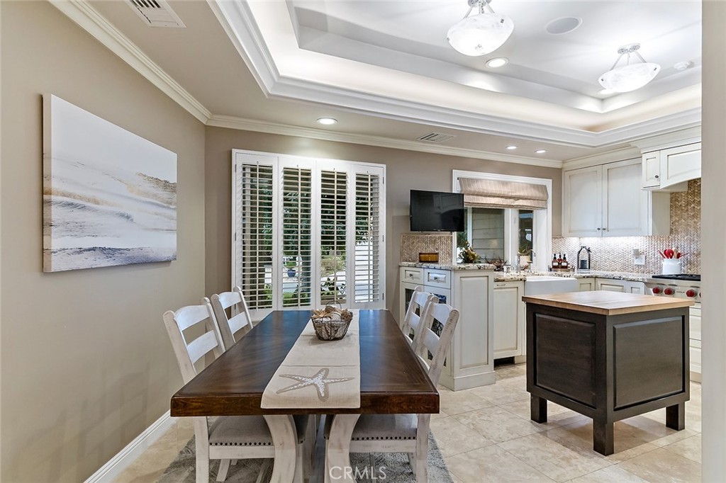6250 Majorca Circle Long Beach, CA 90803 - Photo 19 of 35 a view of kitchen with sink dining table and chairs
