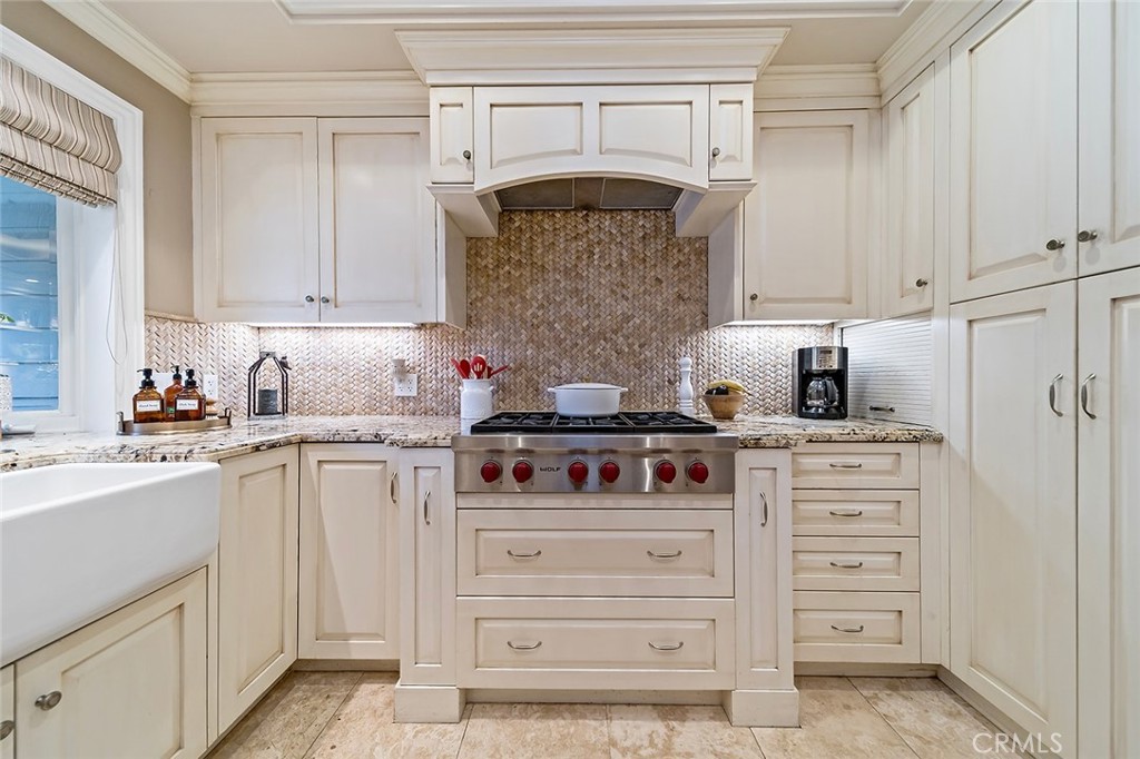 6250 Majorca Circle Long Beach, CA 90803 - Photo 20 of 35 a kitchen with cabinets appliances and a counter top