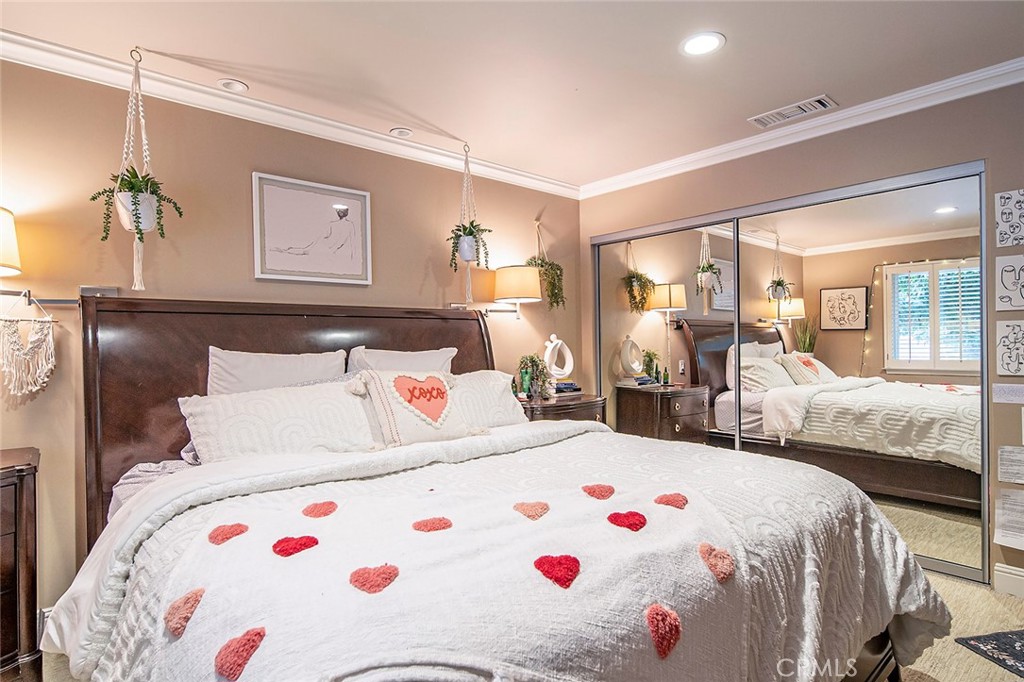 6250 Majorca Circle Long Beach, CA 90803 - Photo 30 of 35 a bedroom with a white bed and white walls