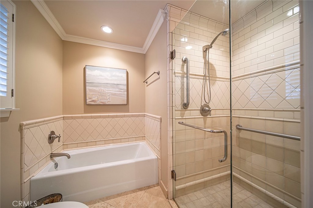 6250 Majorca Circle Long Beach, CA 90803 - Photo 31 of 35 a bathroom with a bathtub and a shower