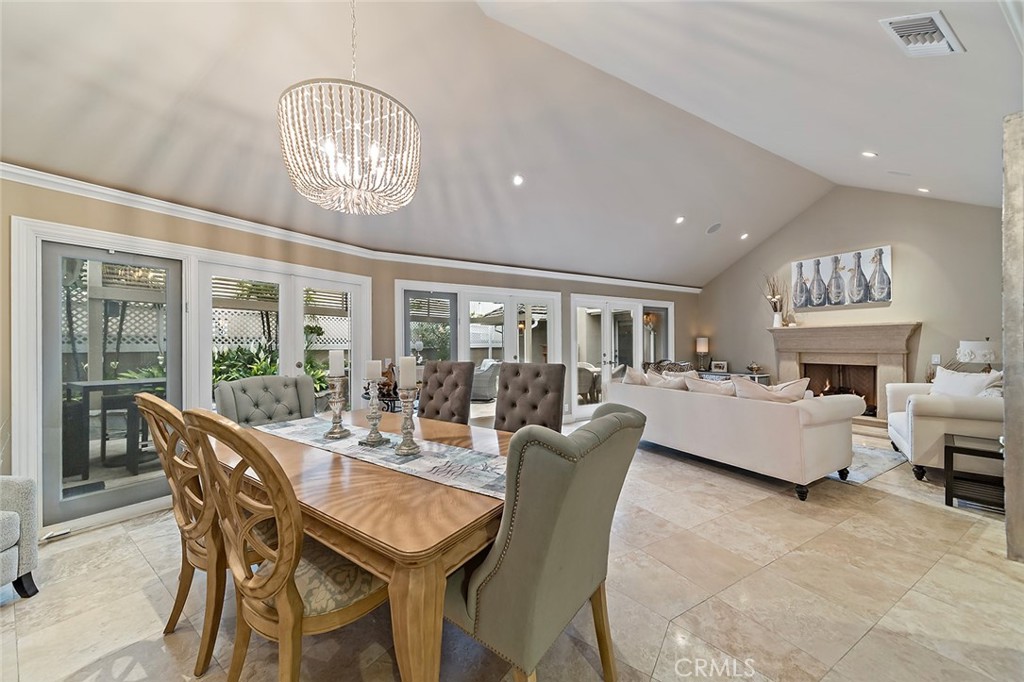 6250 Majorca Circle Long Beach, CA 90803 - Photo 6 of 35 a view of a dining room with furniture a chandelier and wooden floor