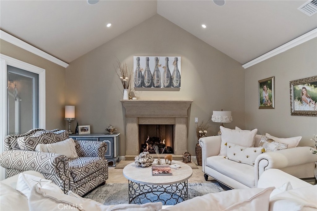 6250 Majorca Circle Long Beach, CA 90803 - Photo 8 of 35 a living room with furniture and a fireplace