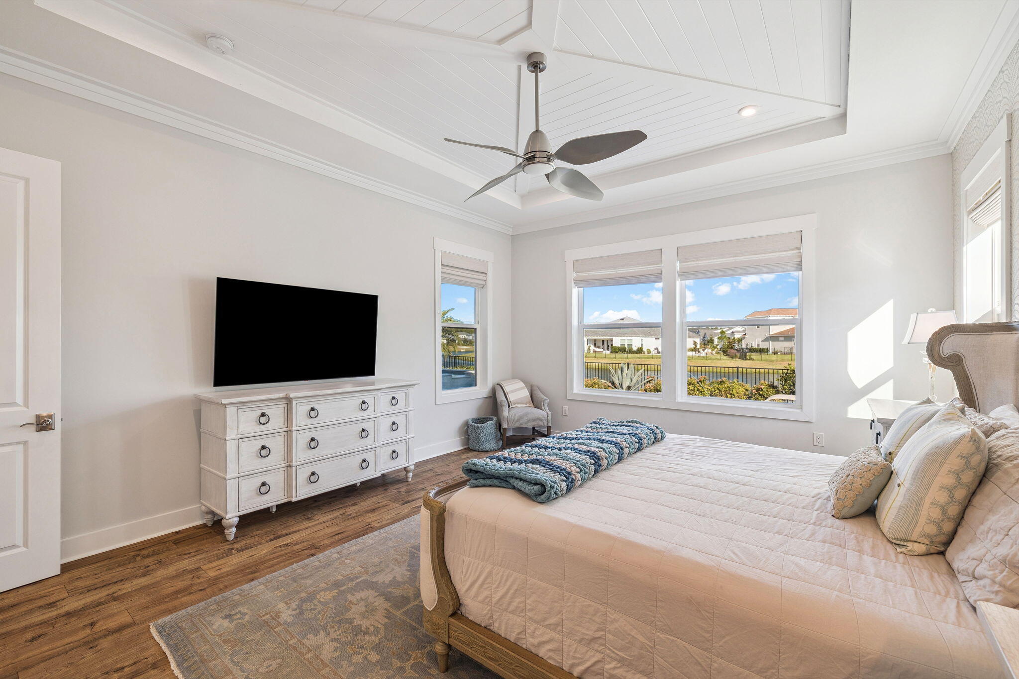 56 River Rise Way Inlet Beach Inlet Beach, FL 32461 - Photo 26 of 69 a bedroom with a bed a window and a flat screen television