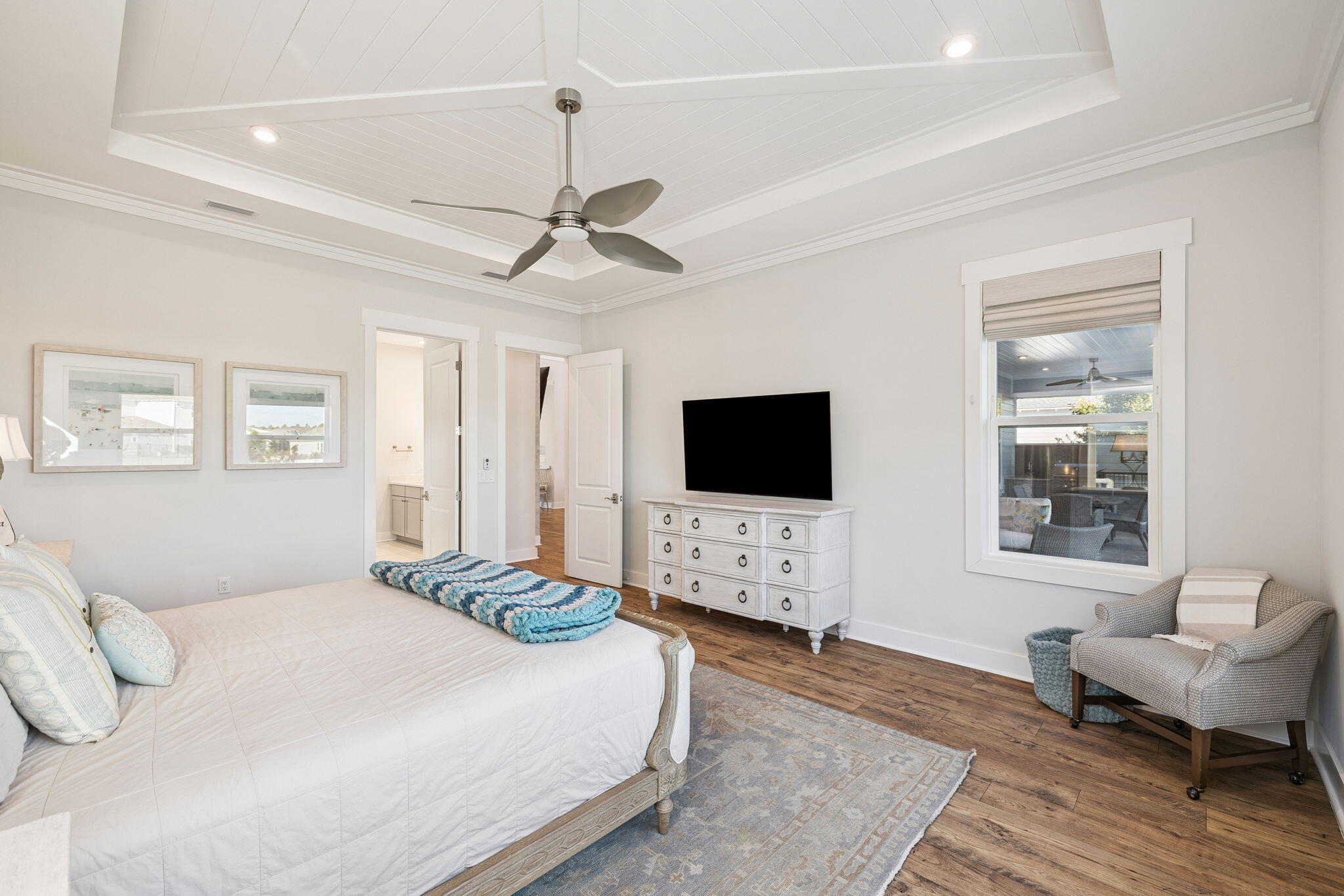 56 River Rise Way Inlet Beach Inlet Beach, FL 32461 - Photo 27 of 69 a bedroom with a bed and a flat screen tv