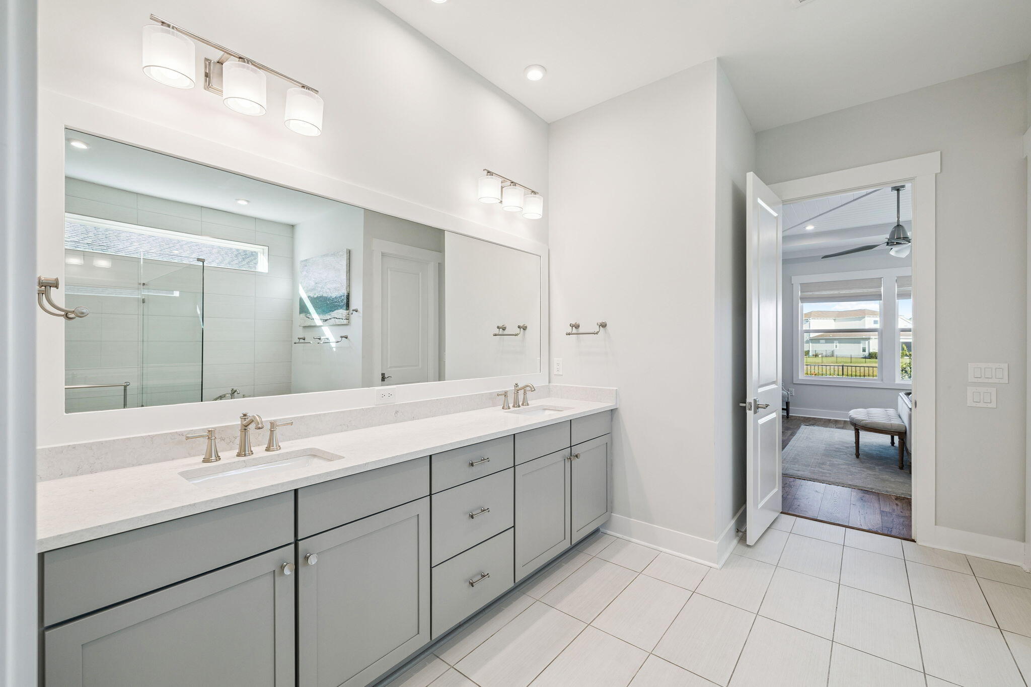 56 River Rise Way Inlet Beach Inlet Beach, FL 32461 - Photo 28 of 69 a spacious bathroom with a granite countertop sink a mirror and a shower