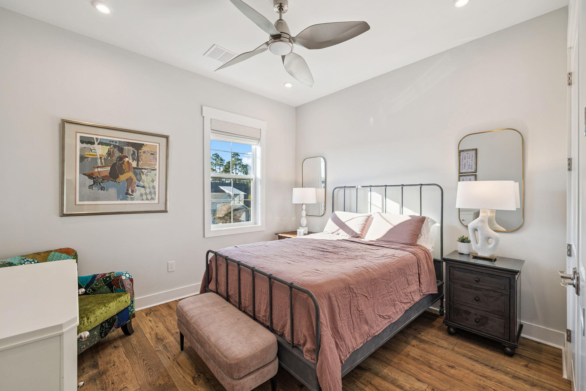 56 River Rise Way Inlet Beach Inlet Beach, FL 32461 - Photo 46 of 69 a bedroom with a bed a chandelier and a chair