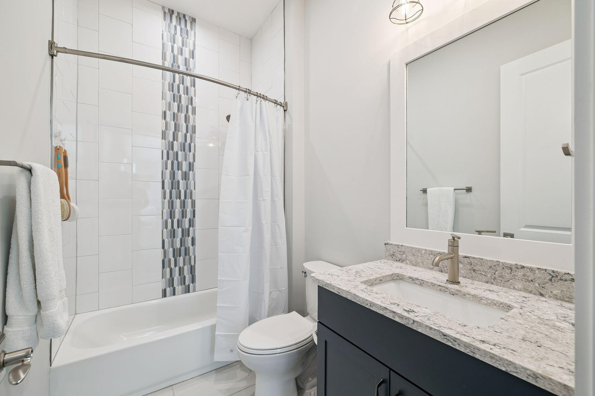 56 River Rise Way Inlet Beach Inlet Beach, FL 32461 - Photo 47 of 69 a bathroom with a granite countertop sink toilet and shower