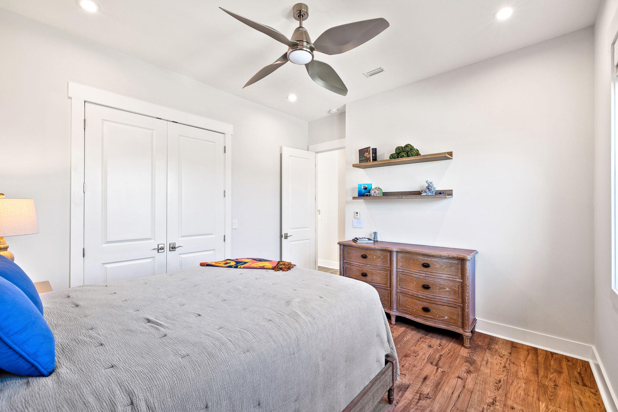 56 River Rise Way Inlet Beach Inlet Beach, FL 32461 - Photo 49 of 69 a bedroom with a bed and a chandelier