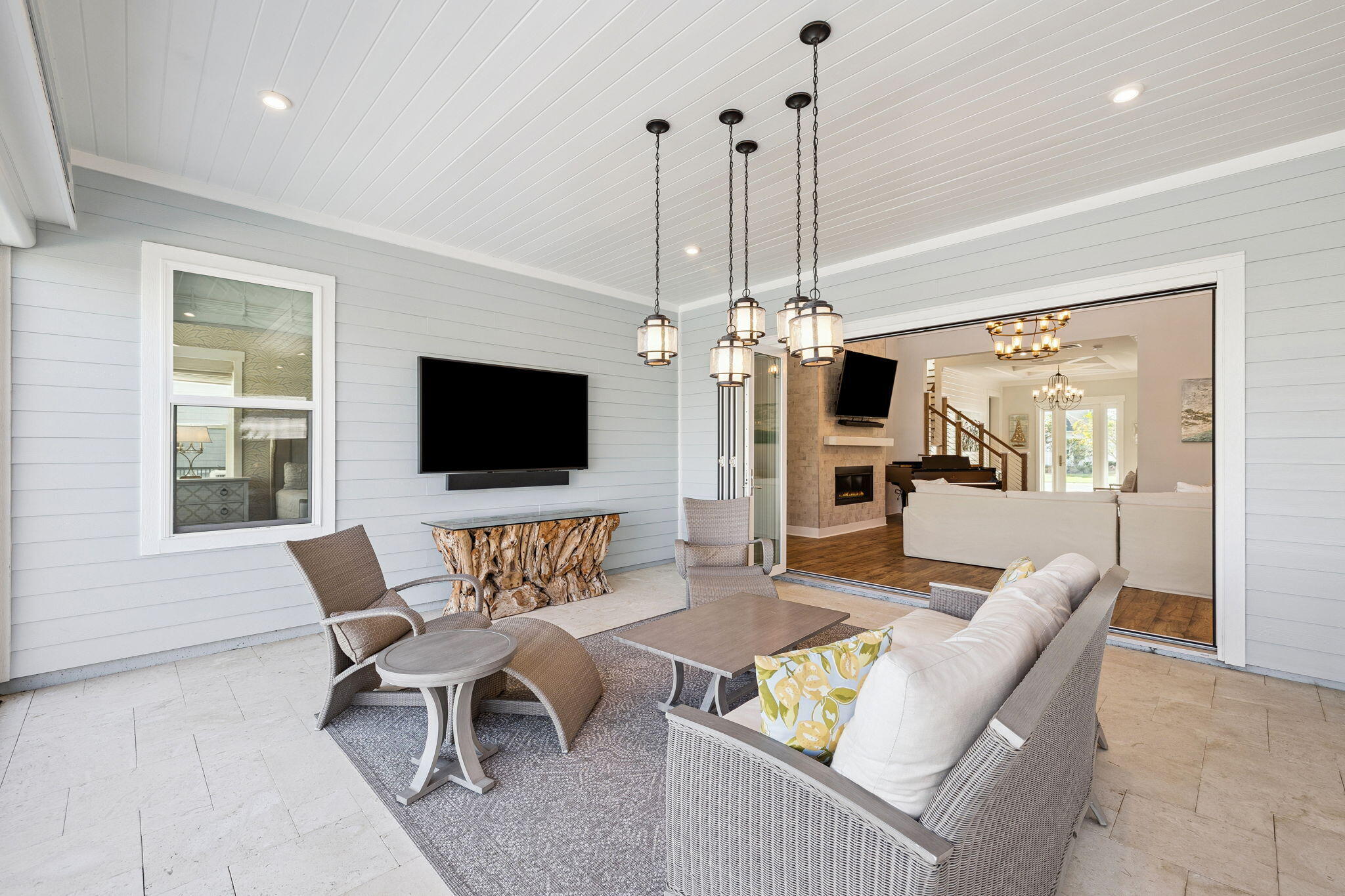 56 River Rise Way Inlet Beach Inlet Beach, FL 32461 - Photo 65 of 69 a living room with furniture a flat screen tv and a chandelier