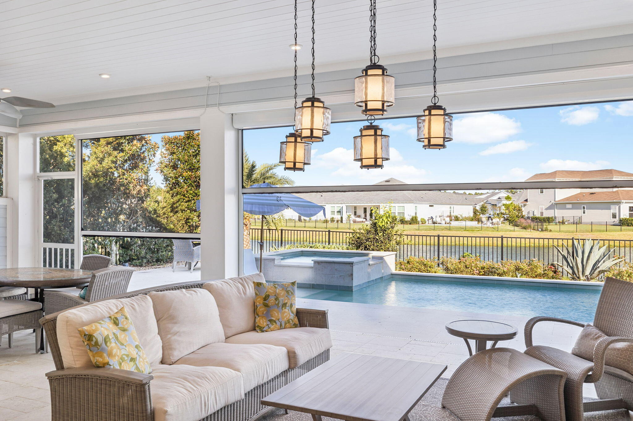 56 River Rise Way Inlet Beach Inlet Beach, FL 32461 - Photo 9 of 69 a living room with furniture and floor to ceiling windows