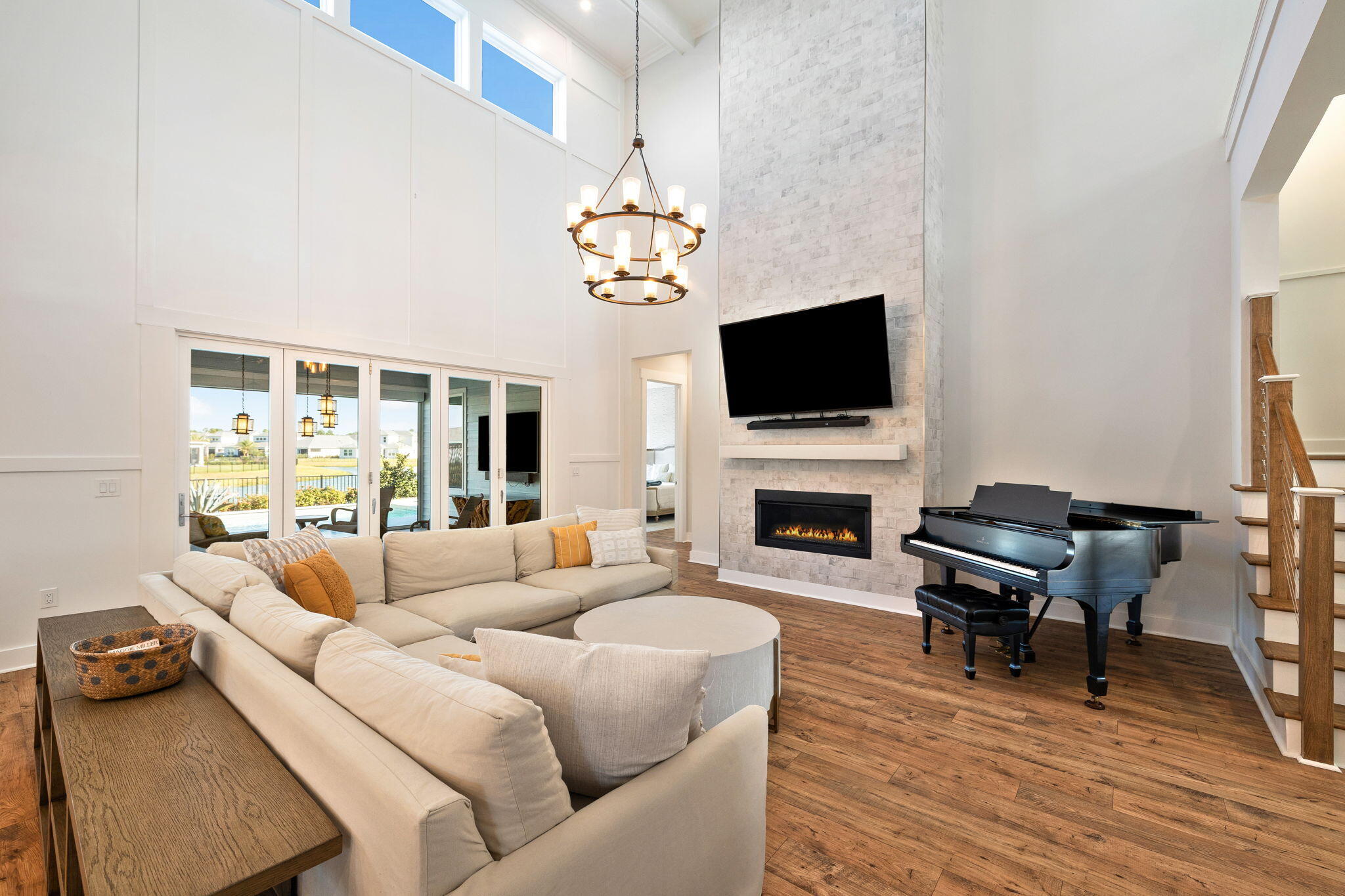 56 River Rise Way Inlet Beach Inlet Beach, FL 32461 - Photo 10 of 69 a living room with furniture a fireplace and a flat screen tv