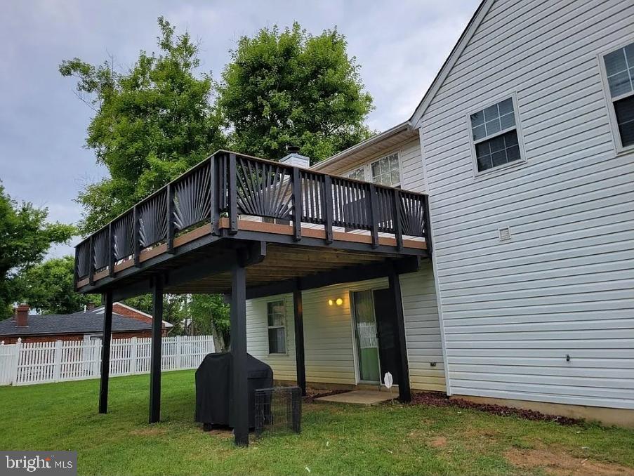 7122 Allentown Road Fort Washington, MD 20744 - Photo 8 of 11 a front view of house with yard and trees in the background