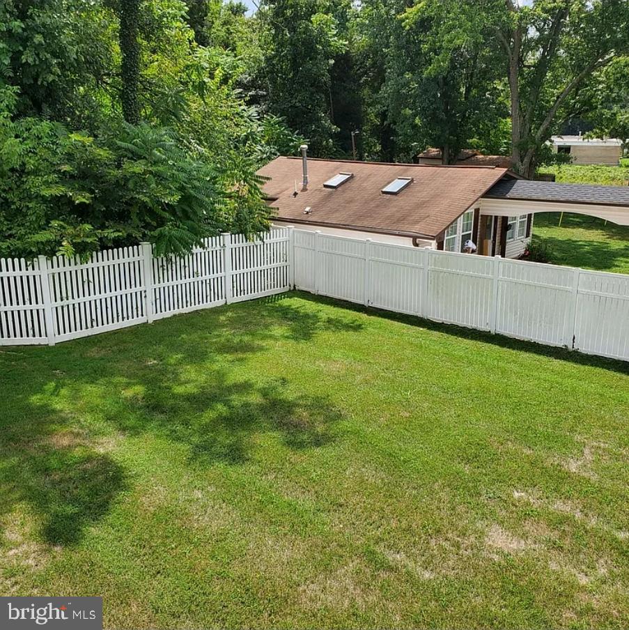 7122 Allentown Road Fort Washington, MD 20744 - Photo 10 of 11 a backyard of a house with lots of green space