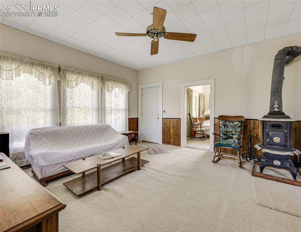 2 County Road 81 Victor, CO 80860 - Photo 11 of 28 a living room with furniture gym equipment and a flat screen tv