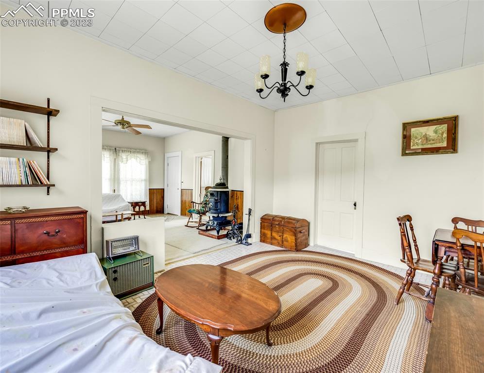 2 County Road 81 Victor, CO 80860 - Photo 16 of 28 a room with furniture and a chandelier