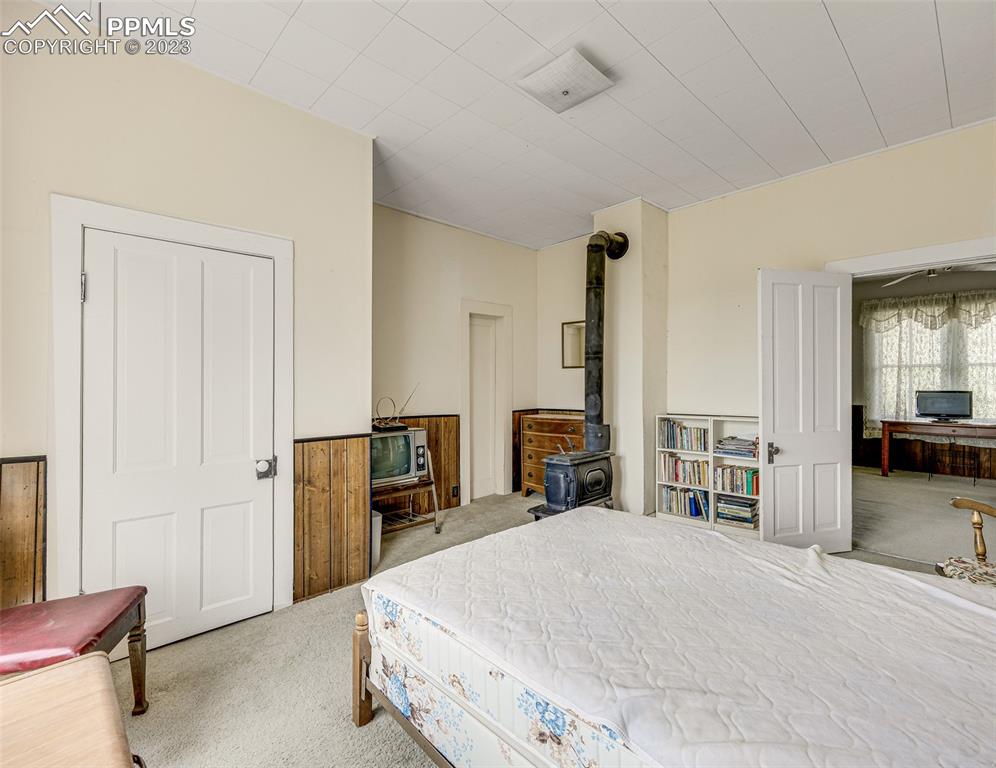 2 County Road 81 Victor, CO 80860 - Photo 20 of 28 a spacious bedroom with a bed and furniture