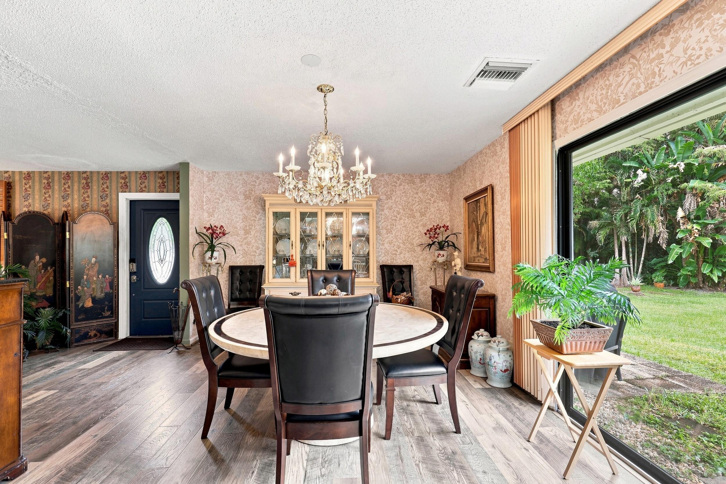 12871 Compton Road Loxahatchee Groves, FL 33470 - Photo 16 of 51 Dining Area & Garden View