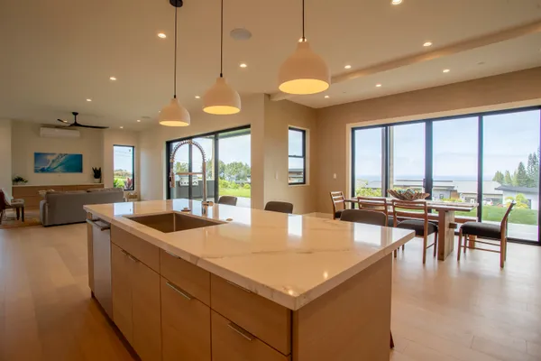a view of a dining room with furniture window and outside view
