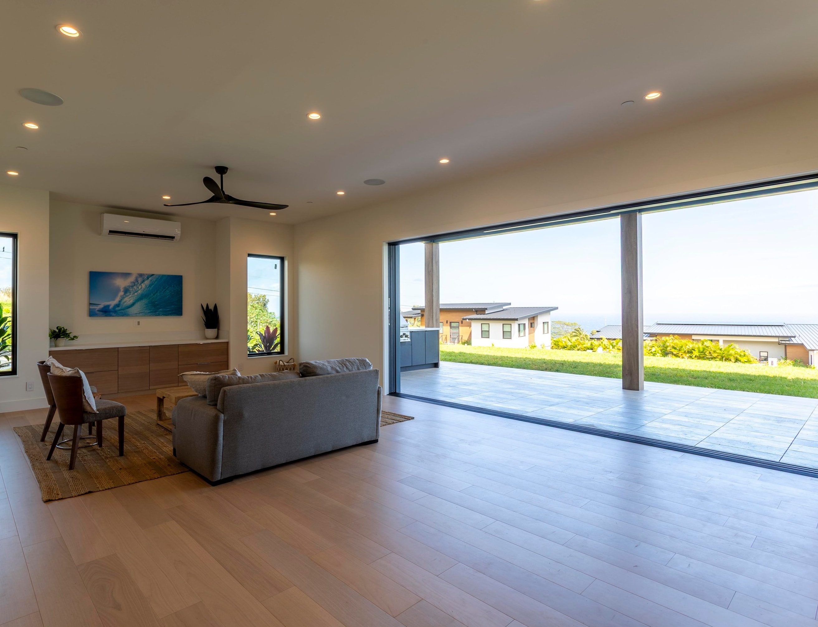 111 Mehana Road, Unit A Haiku, HI 96708 - Photo 18 of 41 a living room with furniture and a large window