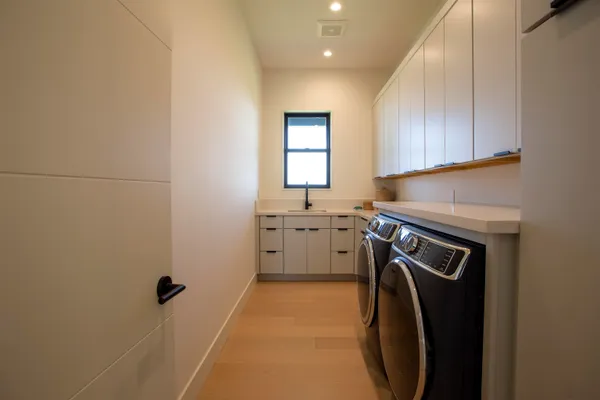 a view of kitchen and utility room