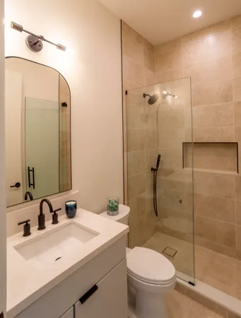 a kitchen with stainless steel appliances a refrigerator and a sink
