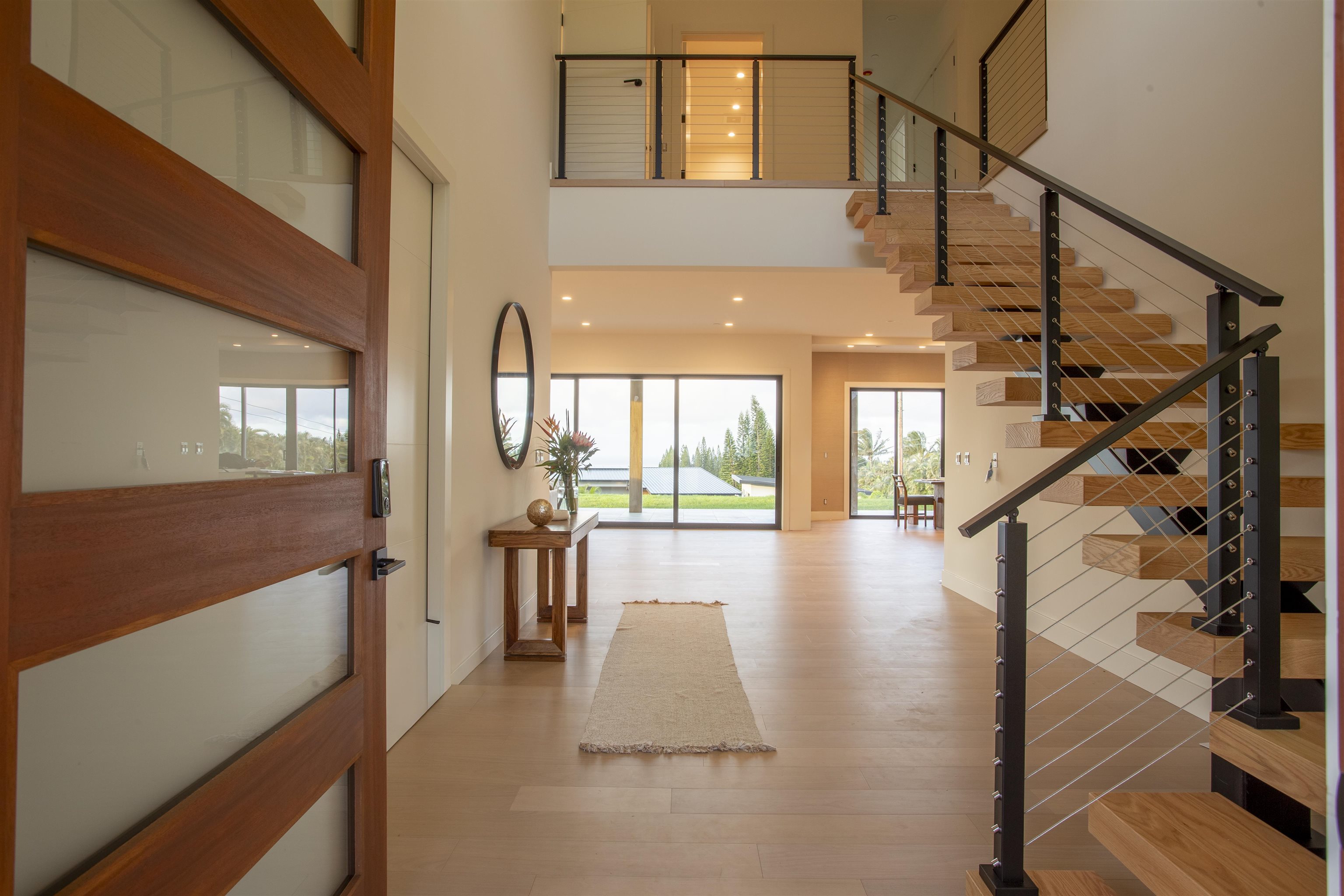 111 Mehana Road, Unit A Haiku, HI 96708 - Photo 7 of 41 a view of entryway and hall with wooden floor