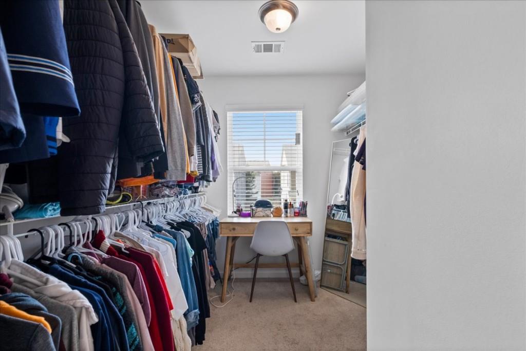 4998 Longview Walk Decatur, GA 30035 - Photo 19 of 29 a view of a bedroom with a bed and a window