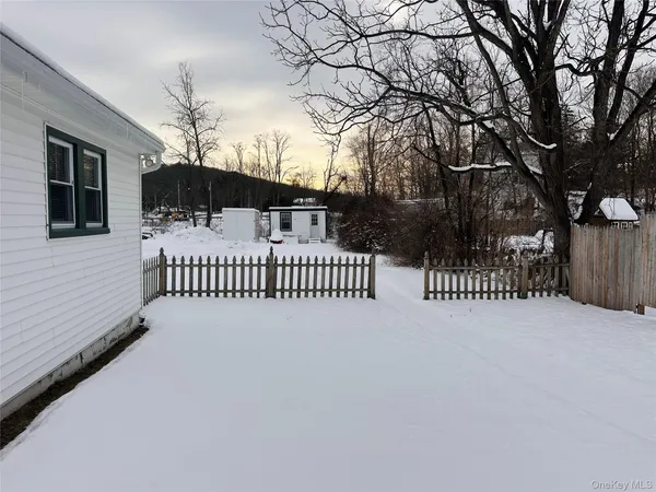 a view of a porch with a fence
