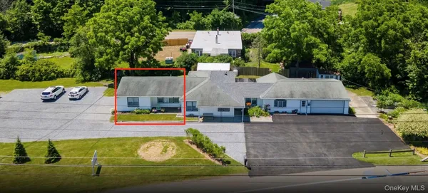 an aerial view of a house with swimming pool