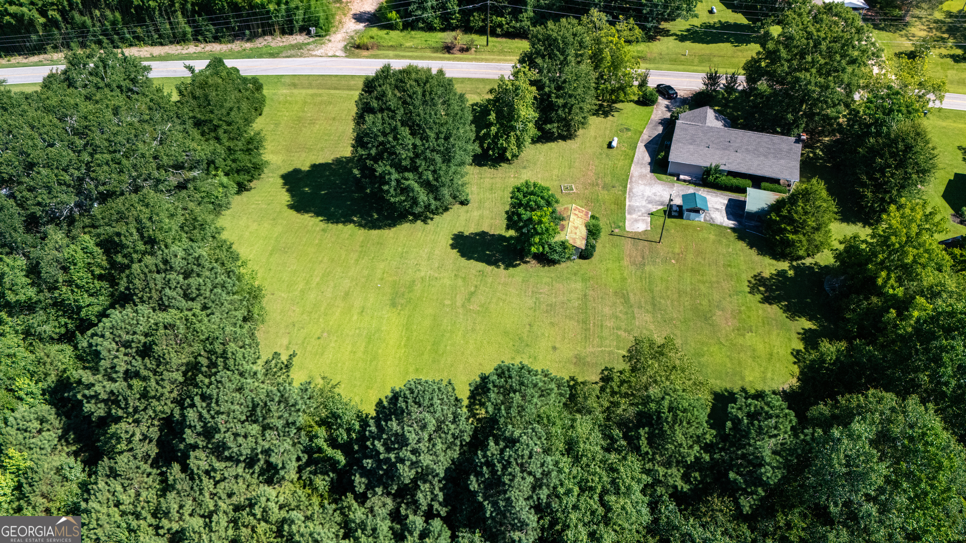 709 Vernon Ferry Road LaGrange, GA 30240 - Photo 25 of 27 an aerial view of residential house with swimming pool and outdoor space