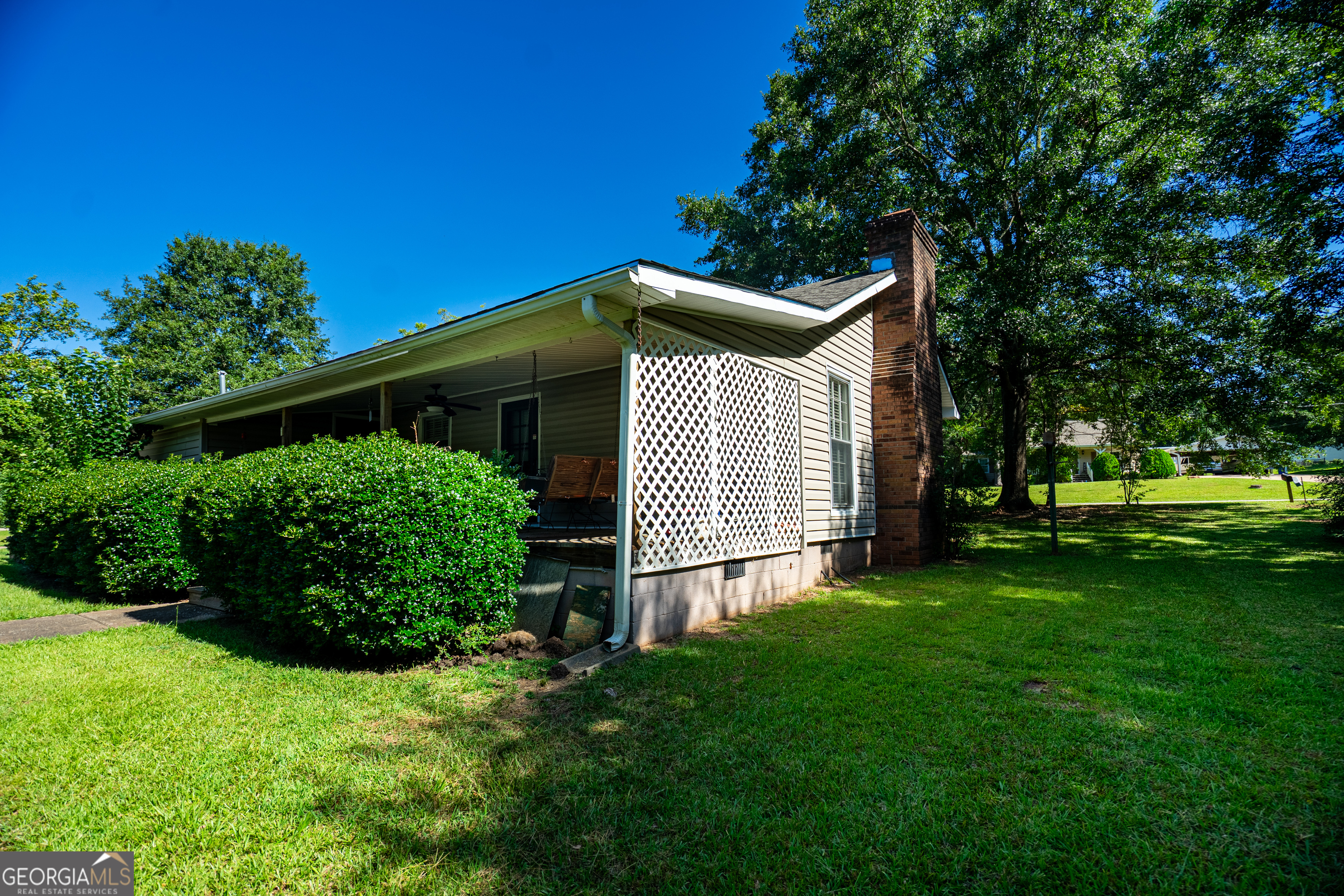 709 Vernon Ferry Road LaGrange, GA 30240 - Photo 3 of 27 a front view of a house with garden